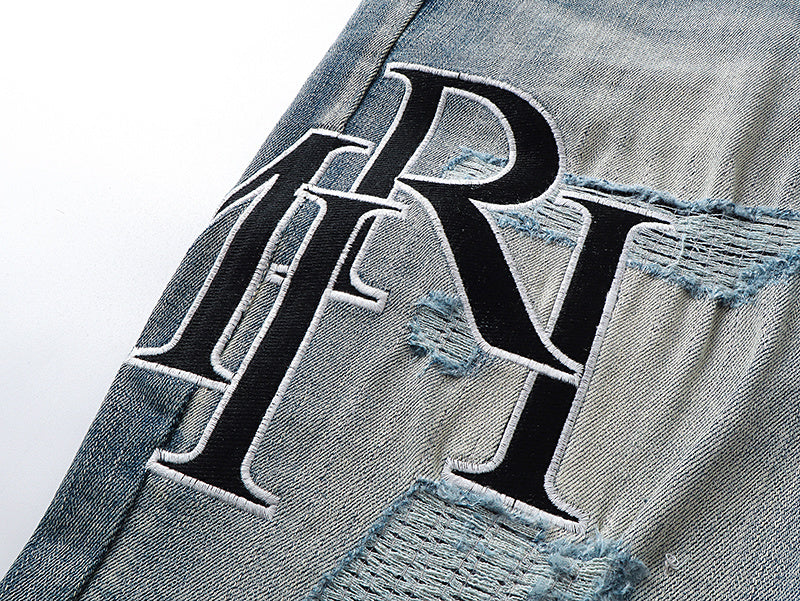 JEAN AMIRI STAGGERED LOGO BLEU | L'Icone Déstructurée