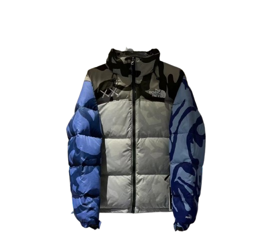 DOUDOUNE THE NORTH FACE X KAWS - COLLABORATION ULTIME ART & OUTDOOR