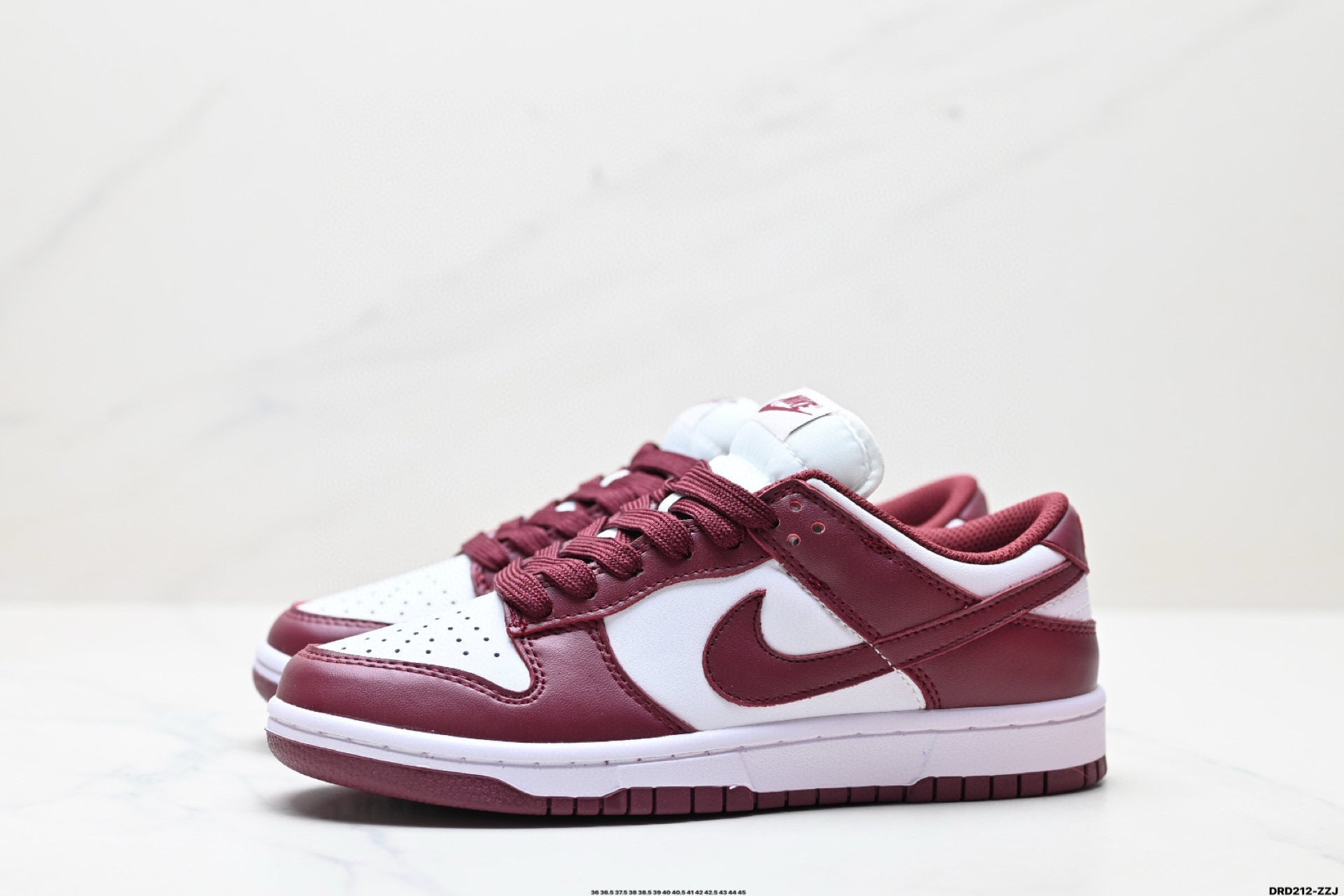 NIKE DUNK LOW BLANC / BORDEAUX - LE CONTRASTE AUDACIEUX