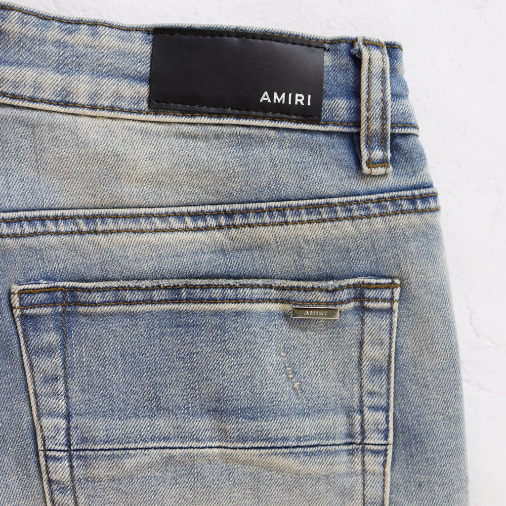 JEAN SKINNY AMIRI EFFET USÉ | L'Art du Déclin Raffiné
