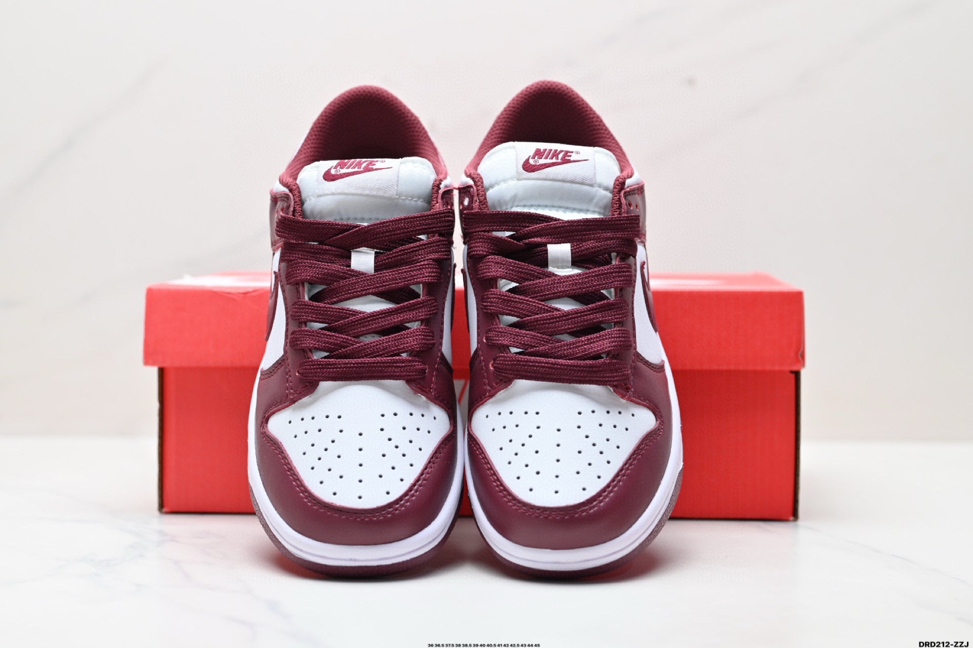 NIKE DUNK LOW BLANC / BORDEAUX - LE CONTRASTE AUDACIEUX