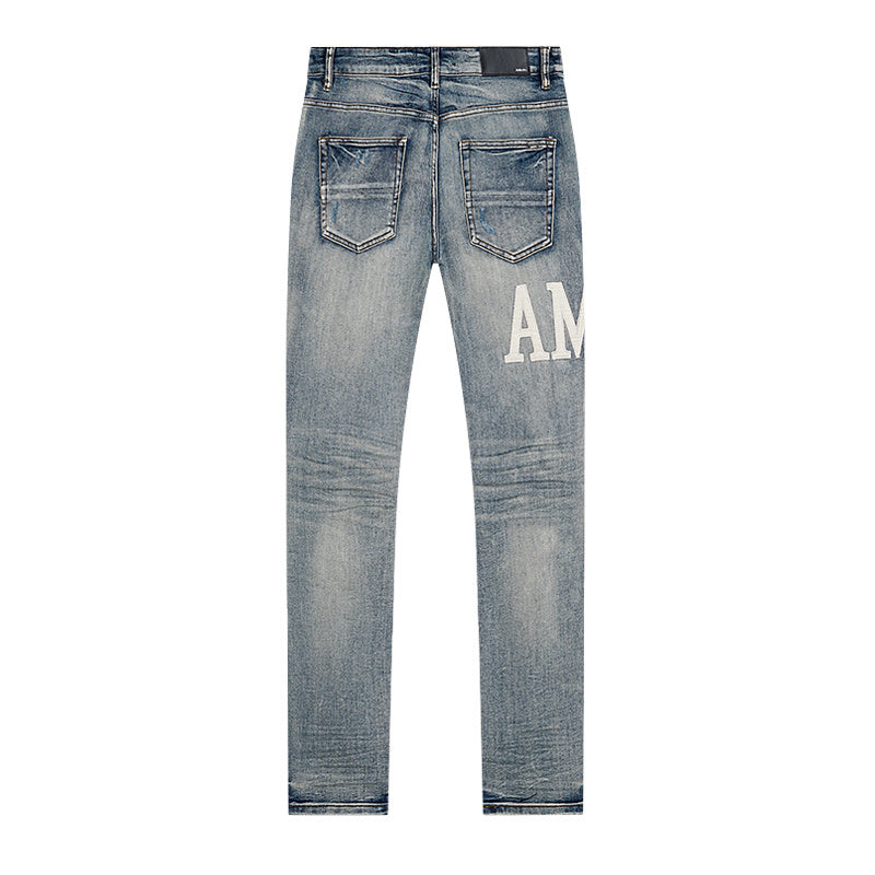 JEAN SKINNY AMIRI LOGO DÉCALÉ | L'Icone en Bleu