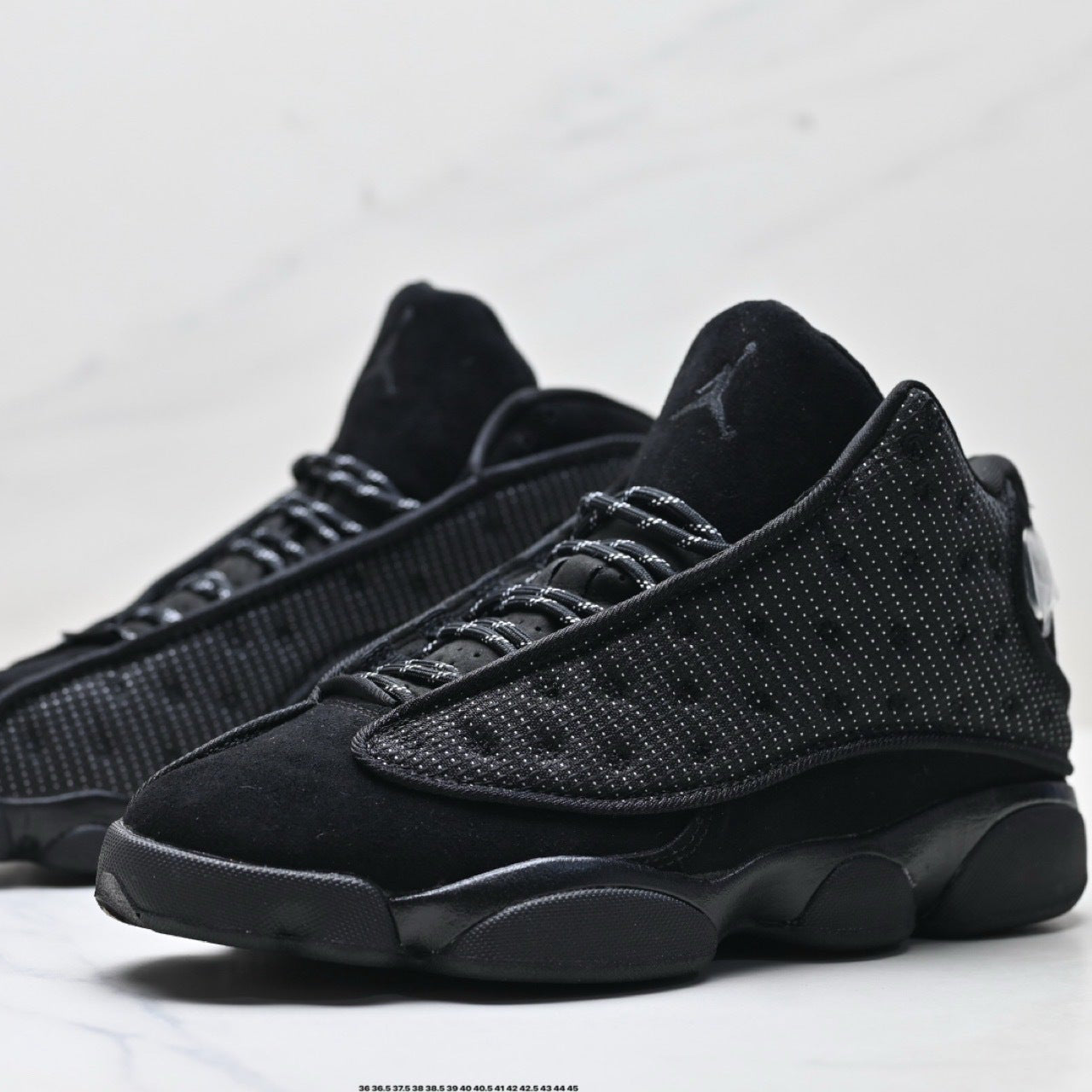 AIR JORDAN 13 « BLACK CAT » - LA PRÉDATRICE NOCTURNE